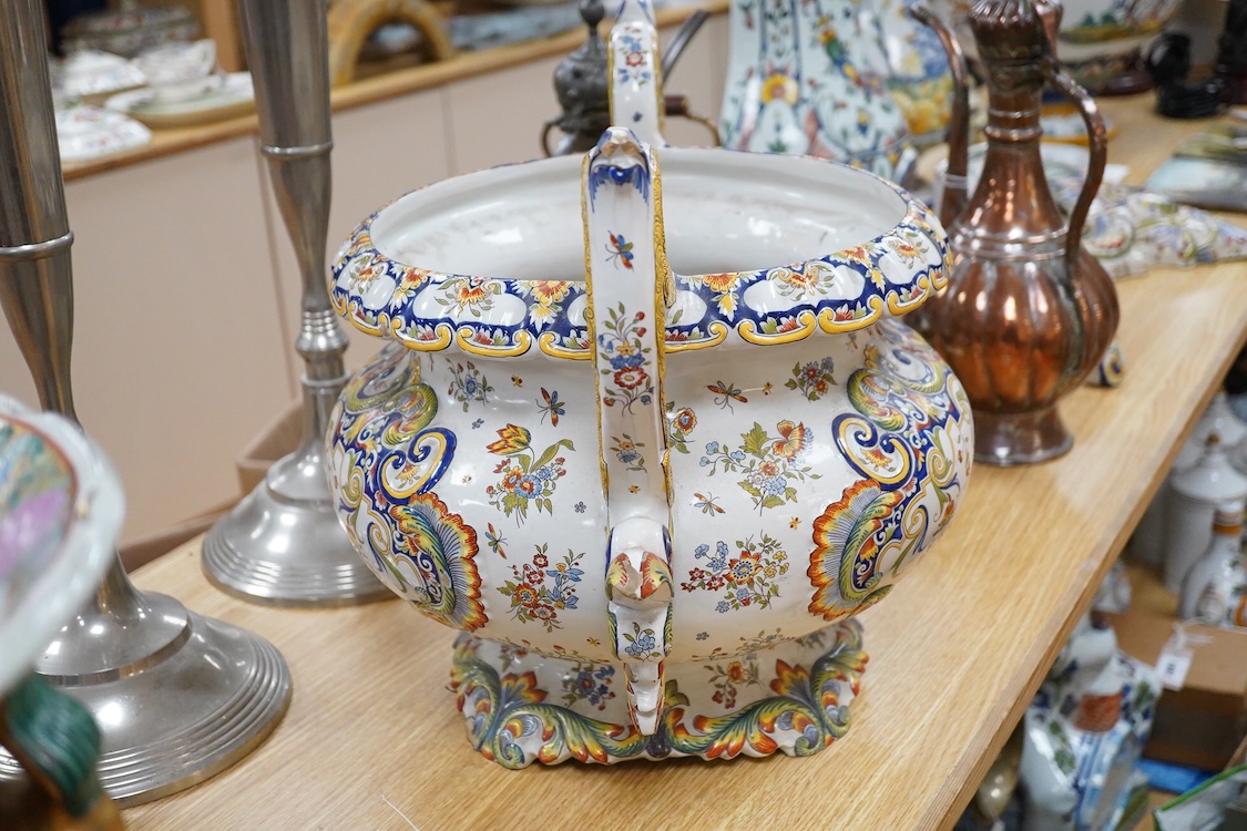 A large ornate two handled French faience planter, 39cm high